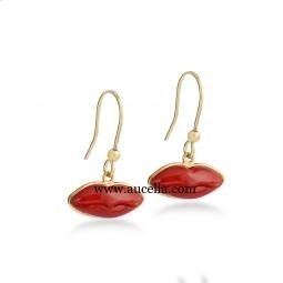 Earrings set in silver with natural coral mouth 